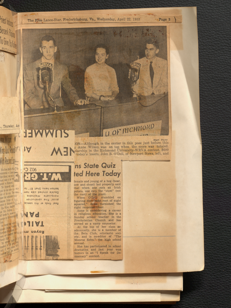 A black and white photo of Anne Wilson beside two high school colleagues in the State Quiz Finals